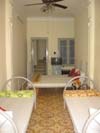 Family quad with city view, balcony, and private facilities (shower)